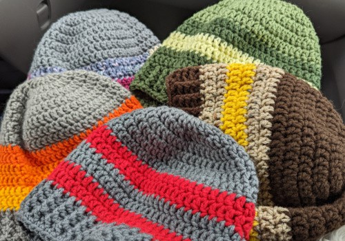 A sock hat will keep your body heat in and therefore keep you warmer when sleeping in a minivan camper in cold temperatures. 