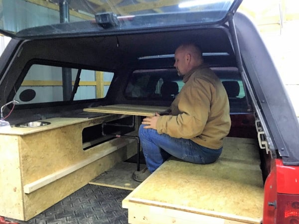 What our DIY truck topper camper table looks like.