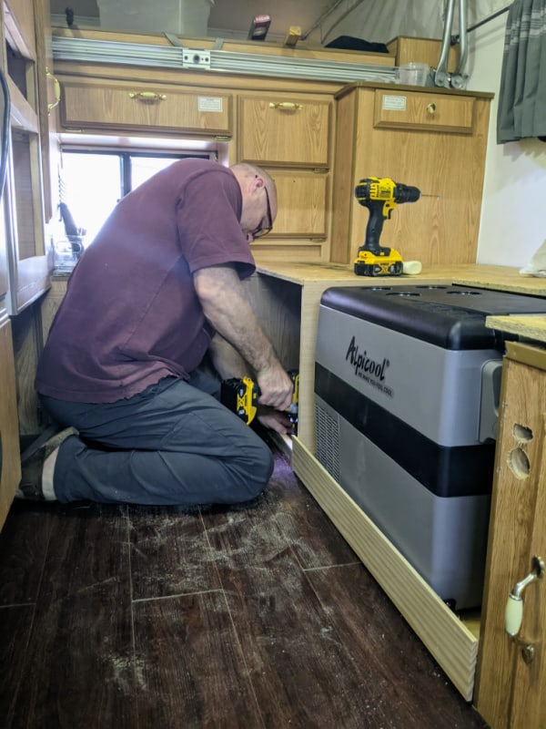 Adding a 12 volt fridge to our truck camper. 