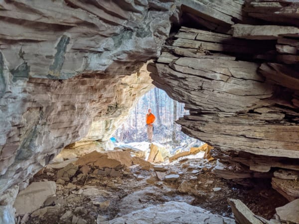Jack standing in Shangri-La arch in Carter Caves Kentucky