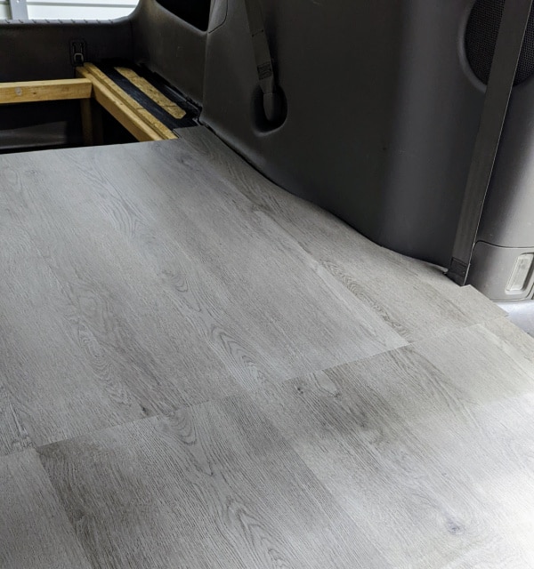 What the vinyl flooring looks like around the edge of the minivan. 
