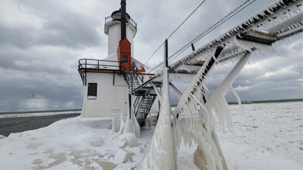 St Joseph, Michigan Inner lighthouse frozen by the cold waters of Lake Michigan. 