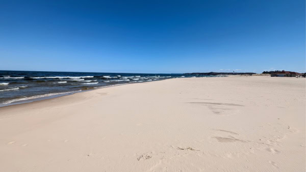 Fifth Avenue Beach in Manistee. This is where you will find the pier out to Manistee North Pier Lighthouse.